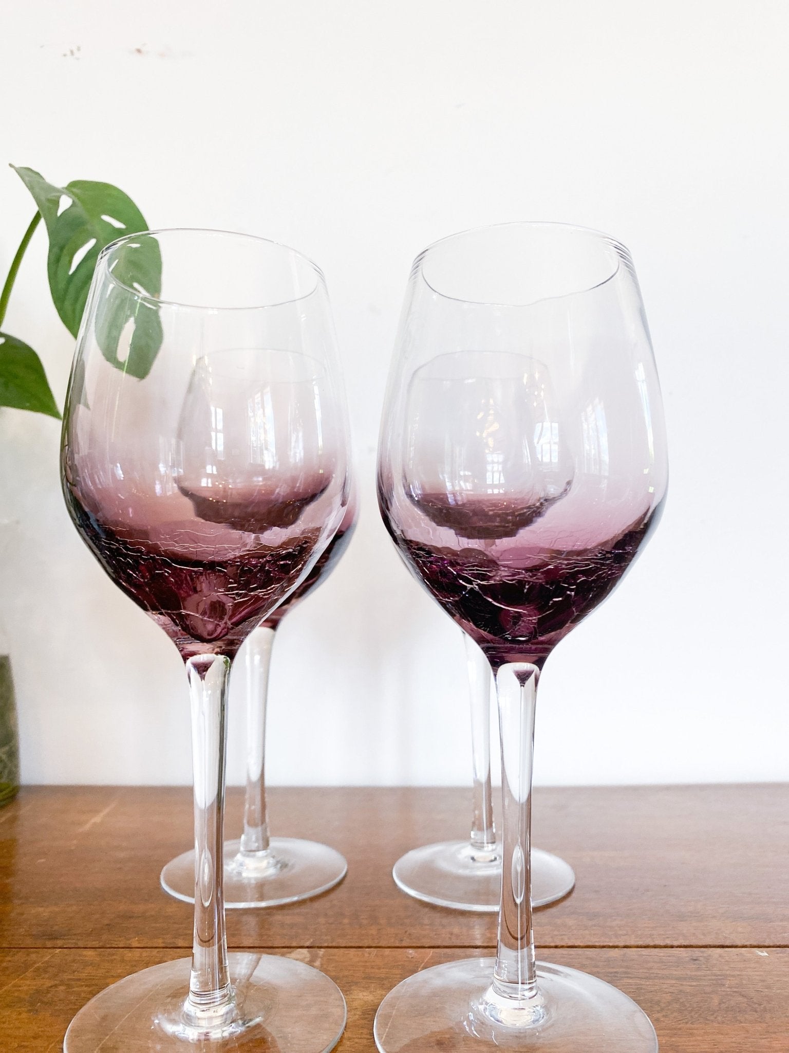 https://www.perthmarket.ca/cdn/shop/products/smoked-glass-wine-glasses-set-of-4-465254.jpg?v=1683376990&width=1946